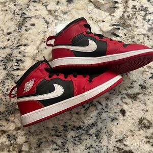 Kids Red and Black Nike Sneakers